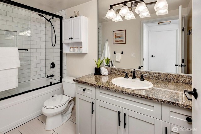 1420 Terry Ave Unit 603, Seattle, WA 98101 - full bath with vanity, toilet, bathtub / shower combination, and tile patterned flooring