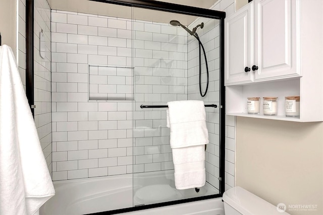 1420 Terry Ave Unit 603, Seattle, WA 98101 - full bathroom with toilet and bath / shower combo with glass door