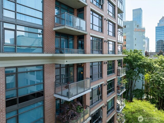 1420 Terry Ave Unit 603, Seattle, WA 98101 - view of apartment building / complex featuring a city view