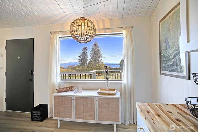 1892 Cascade View Dr, Camano Island, WA 98282 - dining room featuring wood ceiling, wood finished floors, and a chandelier