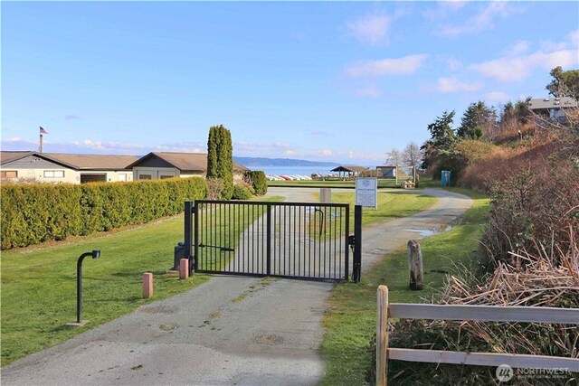 1892 Cascade View Dr, Camano Island, WA 98282 - view of gate featuring a yard and fence