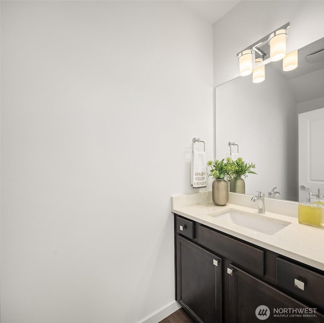 1240 SW 124th St Unit 10B, Burien, WA 98146 - bathroom featuring wood finished floors and vanity