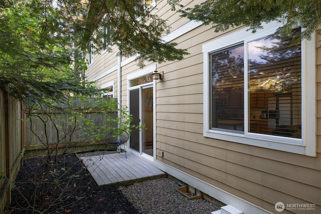 view of side of property with fence