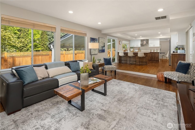 11616 NE 67th St, Kirkland, WA 98033 - living room featuring recessed lighting, wood finished floors, and visible vents