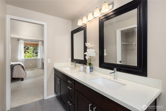 11616 NE 67th St, Kirkland, WA 98033 - ensuite bathroom featuring tile patterned flooring, a sink, connected bathroom, and double vanity