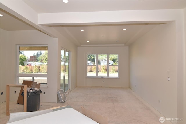 unfurnished room with recessed lighting