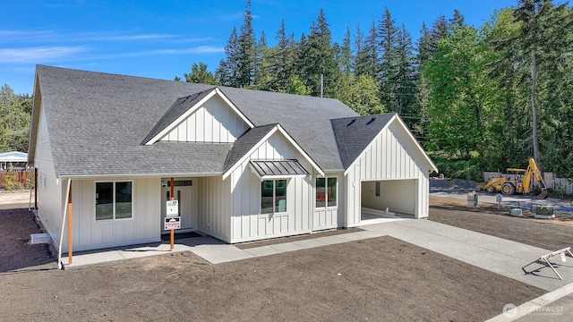 2600 42nd St, Bellingham, WA 98229 - modern farmhouse featuring roof with shingles, driveway, and board and batten siding
