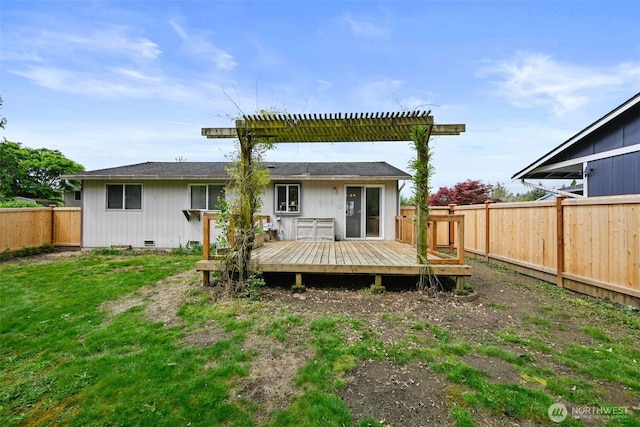rear view of house with a fenced backyard, a pergola, and a deck