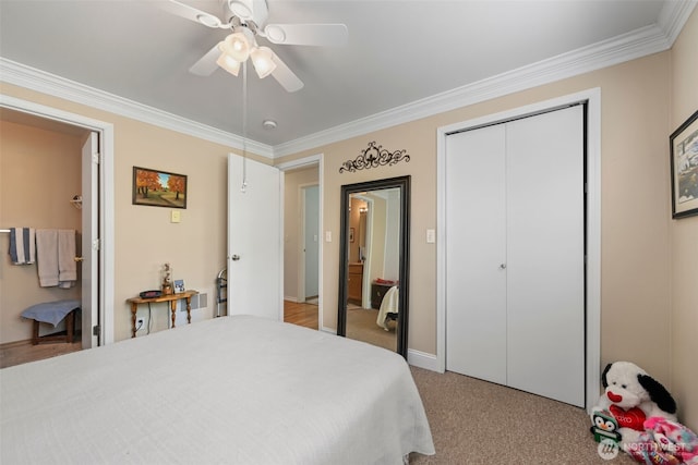 bedroom with ornamental molding, baseboards, ceiling fan, light colored carpet, and ensuite bath
