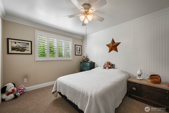 bedroom featuring crown molding, a ceiling fan, baseboards, and carpet