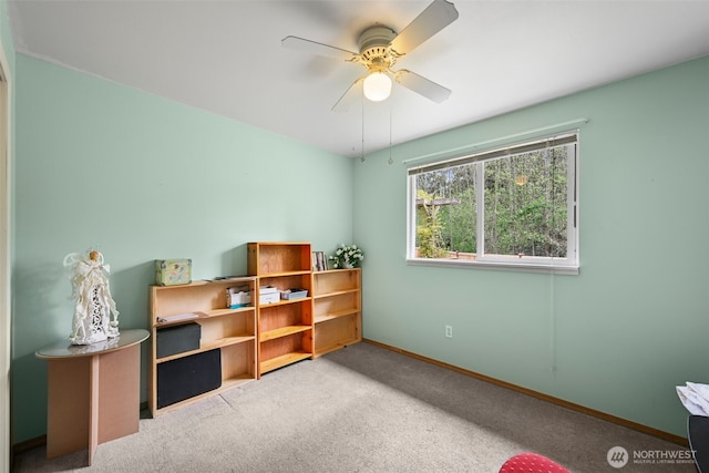 bedroom with baseboards, ceiling fan, and carpet
