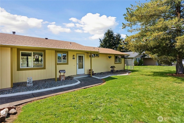 16649 100th Way SE, Yelm, WA 98597 - back of house featuring a lawn