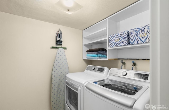 washroom with laundry area and independent washer and dryer
