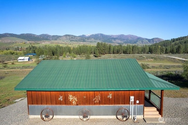 exterior space featuring a mountain view
