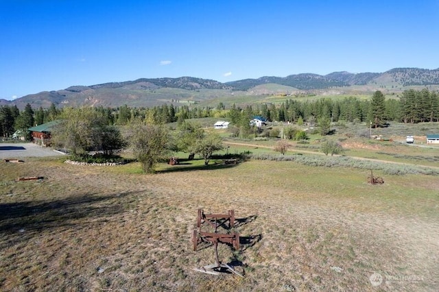 property view of mountains featuring a rural view