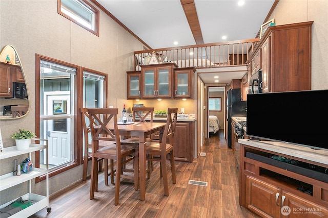990 S Lake Whatcom Blvd Unit 9, Sedro Woolley, WA 98284 - dining room featuring crown molding, dark wood-style flooring, and visible vents