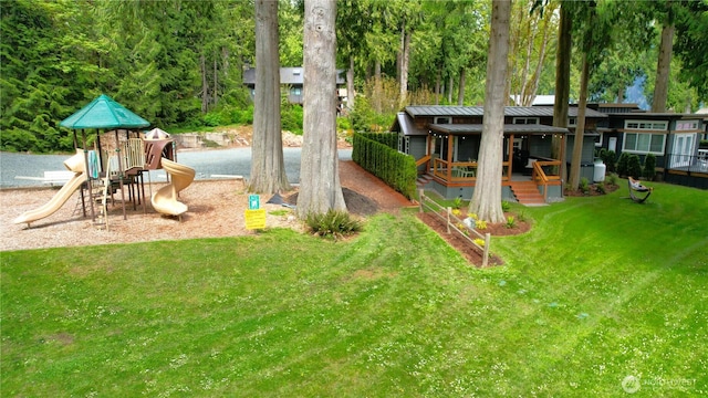 990 S Lake Whatcom Blvd Unit 9, Sedro Woolley, WA 98284 - view of play area with a lawn