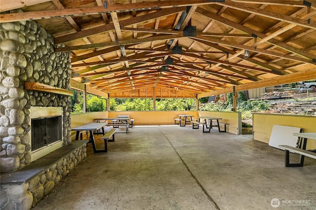 990 S Lake Whatcom Blvd Unit 9, Sedro Woolley, WA 98284 - view of patio / terrace featuring an outdoor stone fireplace