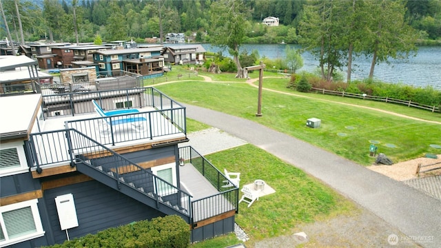 990 S Lake Whatcom Blvd Unit 65, Sedro Woolley, WA 98284 - view of community with stairway, a water view, and a yard