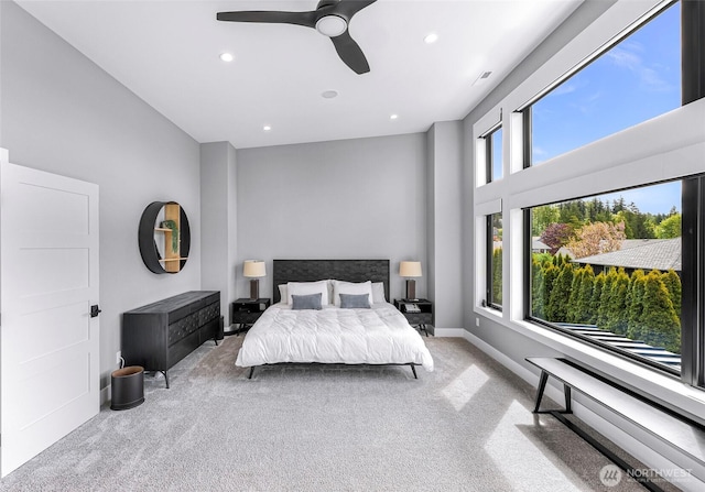 carpeted bedroom with recessed lighting, ceiling fan, and baseboards