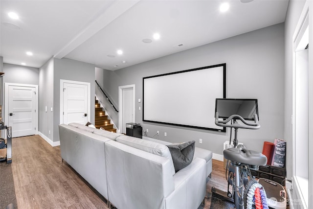 home theater featuring recessed lighting, baseboards, and wood finished floors