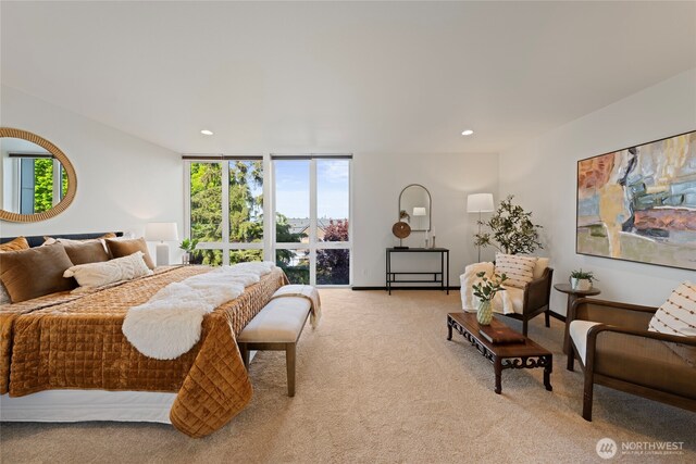 bedroom with recessed lighting and light colored carpet