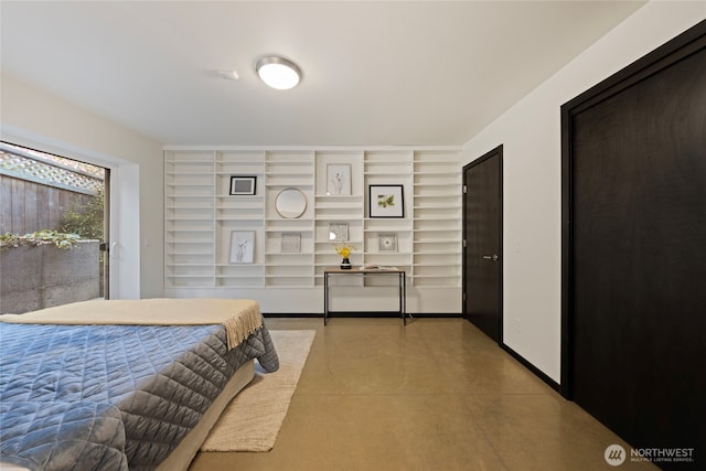 bedroom with concrete flooring