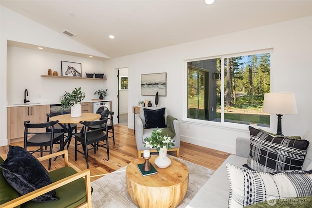 18XX Wanawish Loop, Cle Elum, WA 98922 - living room featuring lofted ceiling, light wood-style flooring, recessed lighting, and baseboards