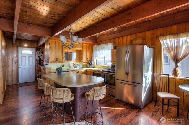 420W Lough Ln, Westport, WA 98595 - kitchen featuring beamed ceiling, dark wood-style floors, and appliances with stainless steel finishes