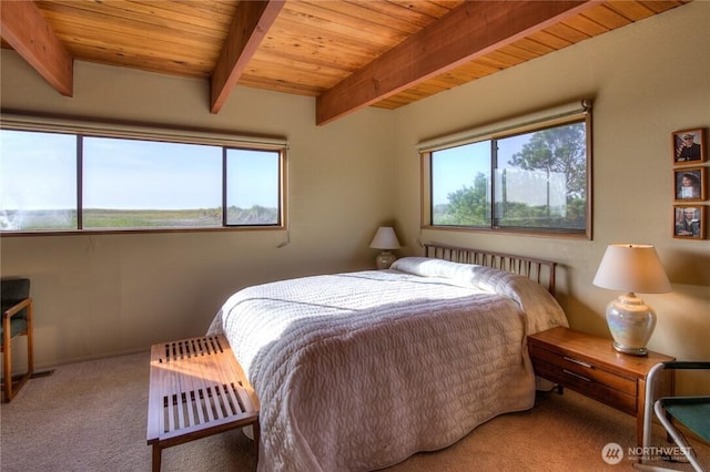 420W Lough Ln, Westport, WA 98595 - bedroom with beamed ceiling, wood ceiling, and carpet