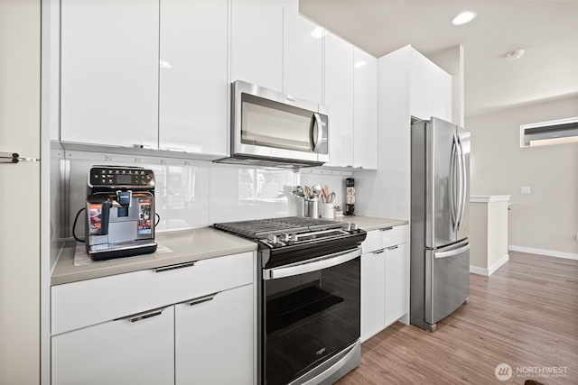 4818 Springside St, Bellingham, WA 98226 - kitchen featuring stainless steel appliances, modern cabinets, and light countertops