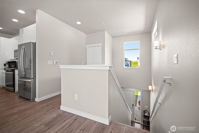 4818 Springside St, Bellingham, WA 98226 - stairway with wood finished floors, healthy amount of natural light, and recessed lighting