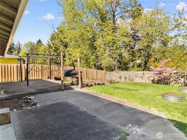 view of patio featuring a fenced backyard and grilling area