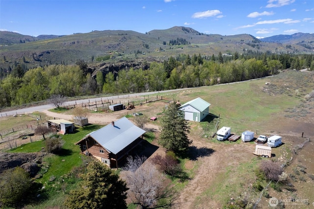 bird's eye view featuring a mountain view and a rural view
