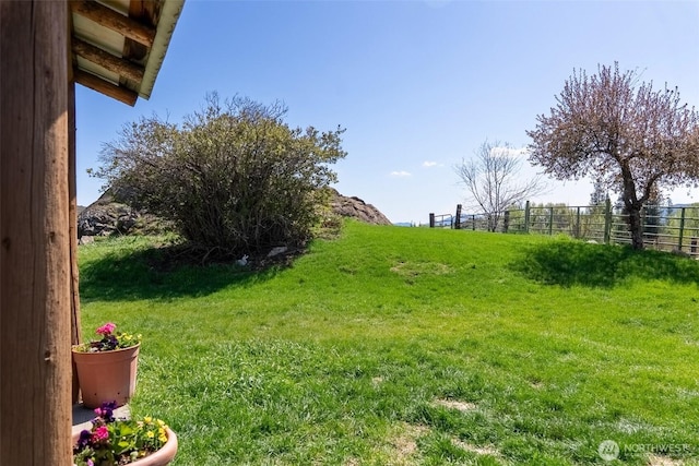 view of yard with fence