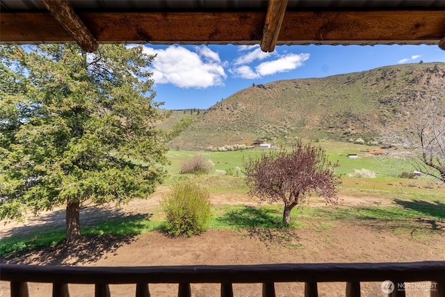 mountain view featuring a rural view