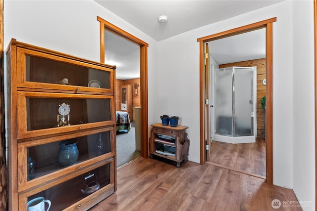 corridor with wood finished floors