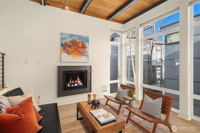2635 22nd Ave W Unit B, Seattle, WA 98199 - sunroom featuring visible vents and beamed ceiling
