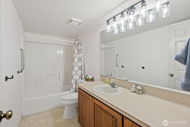 bathroom featuring toilet, shower / tub combo with curtain, and vanity