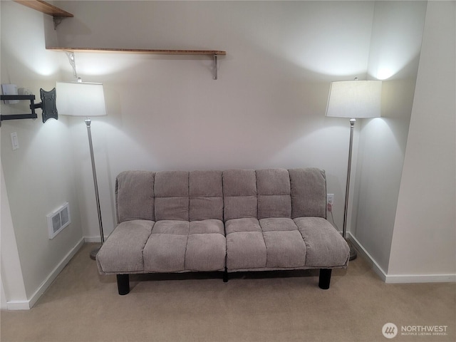 76 Cedar St Unit 608, Seattle, WA 98121 - sitting room with visible vents, carpet, and baseboards