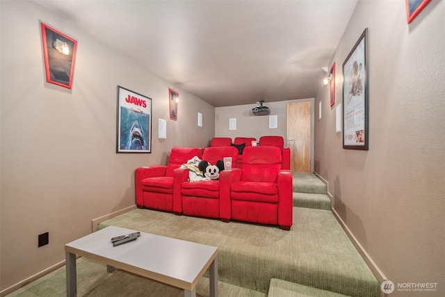 carpeted cinema with baseboards