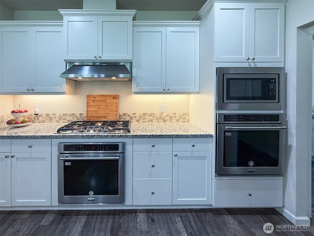 118 Woodview Ln, Napavine, WA 98596 - kitchen featuring appliances with stainless steel finishes, ventilation hood, dark wood finished floors, and white cabinets