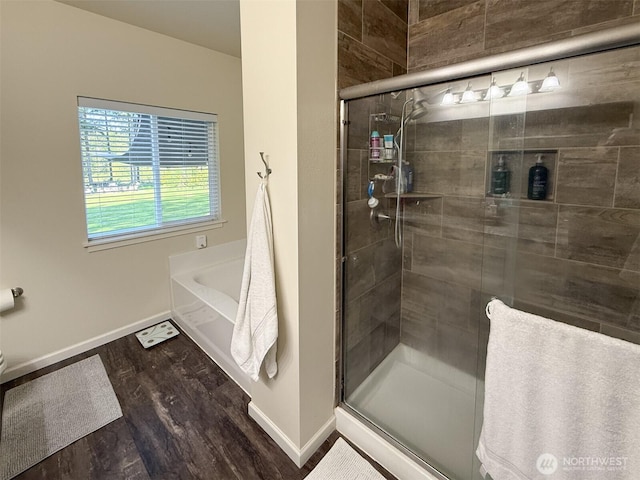 118 Woodview Ln, Napavine, WA 98596 - bathroom with baseboards, a shower stall, wood finished floors, and a garden tub