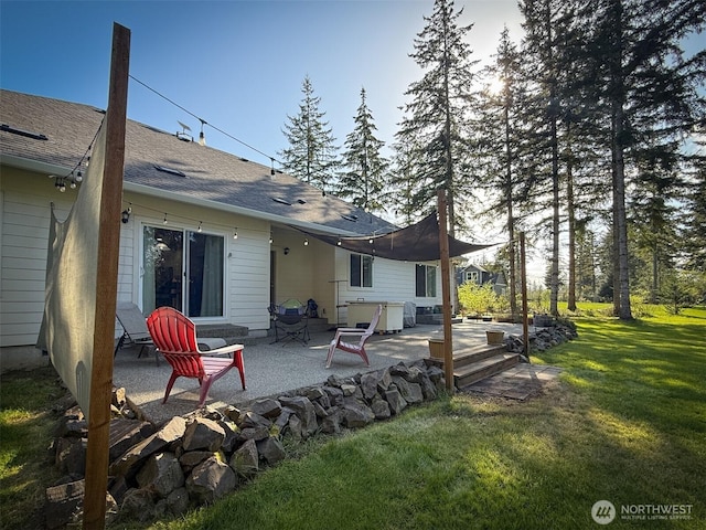 118 Woodview Ln, Napavine, WA 98596 - back of property with a patio, a shingled roof, and a yard