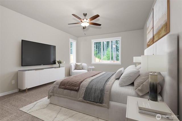 bedroom with carpet floors, a ceiling fan, and baseboards