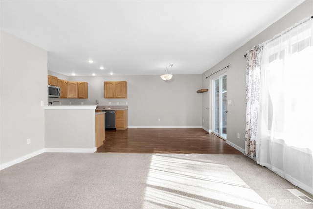 unfurnished living room featuring baseboards, recessed lighting, and dark wood-style floors