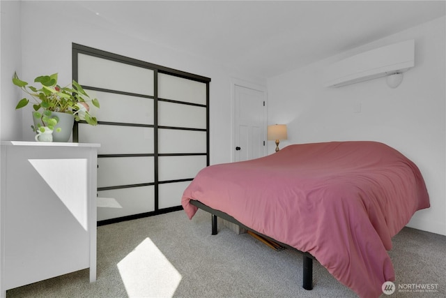 9624 SW Gorsuch Rd, Vashon, WA 98070 - carpeted bedroom with a wall mounted air conditioner