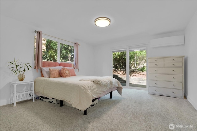 9624 SW Gorsuch Rd, Vashon, WA 98070 - carpeted bedroom with a wall unit AC and multiple windows
