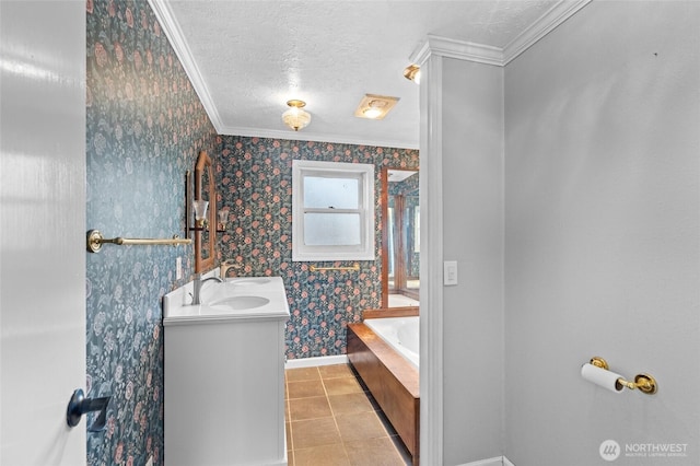 full bathroom featuring a garden tub, a textured ceiling, tile patterned flooring, baseboards, and ornamental molding
