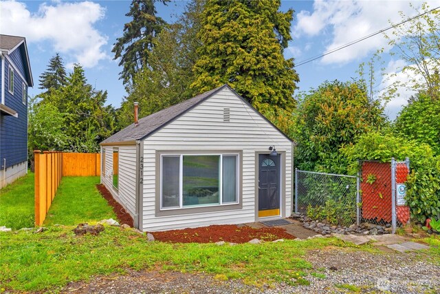 view of outbuilding featuring fence private yard
